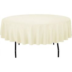 a round table with black legs and a white tablecloth on the top is shown