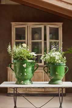 A beautiful pair of green glazed terracotta urns from the late 19th century. Handmade in the village of Castelnaudary in the South of France they would make a stylish addition to any home filled with either flowers or houseplants. Glazed Terracotta, Violet Grey, South Of France, 19th Century, France, Flowers, Green