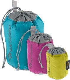 three different colored drawsacks are shown side by side