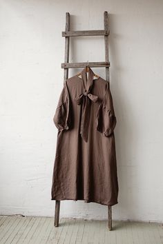 Kimono style oversized dress is made from 100% soft and washed Oeko-Tex certified linen. Details: - Composition: 100% Oeko-Tex certified linen - Colour: cacao - Dropped shoulders - Linen belt - Size: One size - fits all - Medium weight linen - Linen care: machine wash gentle; tumble dry low, ironing optional - The price is for one dress, other pictured items are not included Measurements: Length (from neck down) - 125 cm (49,2 in) Chest width - 140 cm (55,1 in) Sleeve length (from collar) - 60 c Victorian Aprons, Plus Size Linen Dress, Pink Linen Dress, Kimono Style Dress, Plus Size Linen, Linen Pinafore, Natural Linen Dress, Black Linen Dress, Elastic Waist Dress