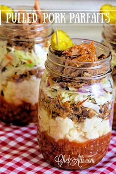 three jars filled with food sitting on top of a checkered tablecloth covered table