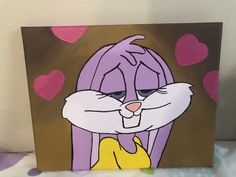 a painting of a cartoon character with hearts on the wall in the background and an image of a cat's face