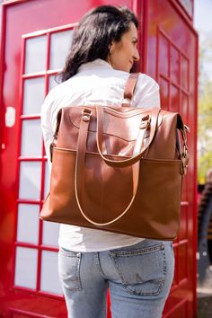 Brown convertible bag can be used as a shoulder bag, crossbody bag or a backpack. You can choose any comfortable variant for you. Especially, it is very convenient when walking with children, your handbag can be transformed into a backpack and you have free hands) Product description - one pocket inside - two big pockets outside - zipper closure - two handles for shoulder wearing - adjustable shoulder strap Product dimensions Height - 30cm/11.8 inch Length - 36 cm/14 inch Width - 12 cm/4.72 inch Large Capacity Leather Shoulder Backpack For On-the-go, Large Capacity Leather Satchel Backpack For Errands, Everyday Crossbody Weekender Bag, Weekender Bag With Detachable Strap For Everyday Use, Brown Duffle Bag For On-the-go, Satchel Weekender Bag For Errands, Everyday Leather Tote Backpack With Detachable Strap, Large Capacity Leather Shoulder Backpack For Travel, Versatile Leather Tote Backpack For Everyday Use