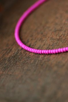 This minimalist dainty choker was made of bright pink (fuchsia color) 3 mm glass seed beads, stainless steel clasps, double strong nylon thread, stainless steel lobster claw and stainless steel adjustable length chain. Perfect everyday wear summer jewelry!  You can wearing it with other necklaces or alone! The length of necklace is about 42 cm or about 16.5 inches and about 4.5 cm of adjustable length stainless steel chain. Other necklaces of my shop you can see here: https://www.etsy.com/shop/N Pink Choker With Round Tiny Beads, Pink Beaded Dainty Choker, Minimalist Pink Round Bead Necklaces, Minimalist Pink Necklace With Round Beads, Minimalist Pink Round Bead Necklace, Beads Choker, Hot Pink Shorts, Dainty Choker, Necklace Minimalist