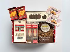 an assortment of snacks and treats in a box