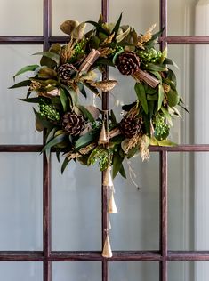 a wreath hanging on the side of a door