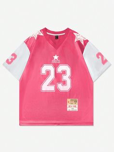 a pink jersey with the number 23 on it