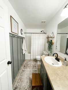 the bathroom is clean and ready to be used as a guest room or family room