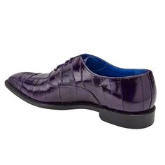 This patchwork captoe dress shoe from Belvedere features a genuine ostrich leg and eel skin upper. This shoe comes in a leather sole, with a cushioned leather insole. Made by hand by artisans in Mexico. Formal Purple Leather Shoes With Leather Sole, Fitted Cap Toe Dress Shoes With Textured Sole, Fitted Crocodile Pattern Dress Shoes With Round Toe, Fitted Dress Shoes With Crocodile Pattern And Round Toe, Fitted Snip Toe Oxfords For Galas, Fitted Dress Shoes With Textured Sole And Almond Toe, Fitted Almond Toe Dress Shoes With Textured Sole, Fitted Wingtip Dress Shoes With Crocodile Pattern, Fitted Moc Toe Oxfords With Leather Sole