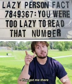 a man pointing to the side of a sign that says lazy person fact 789 - 597 you were too lazy to read that number