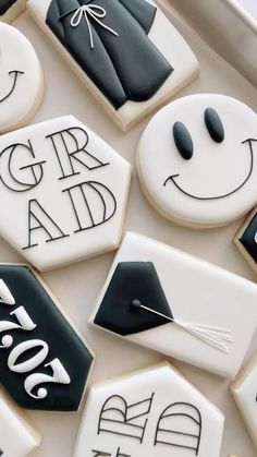 decorated cookies with black and white graduation decorations