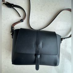 Beautiful Barney’s New York Black Leather Cross Body Bag In Perfect Condition (Never Worn). Leather Lined, Gorgeous!! Adjustable 21.5 Inch Leather Strap Drop. Black Evening Shoulder Bag With Flap, Black Flap Satchel For Evening, Black Flap Shoulder Bag For Office, Black Shoulder Bag With Magnetic Closure, Black Flap Shoulder Bag For Everyday, Everyday Black Shoulder Bag With Magnetic Closure, Black Soft Leather Flap Bag For Office, Black Satchel With Magnetic Closure For Daily Use, Black Soft Leather Crossbody Flap Bag