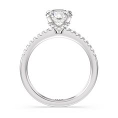 a diamond engagement ring on a white background