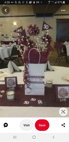 the table is set up for a 50th birthday party