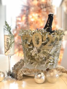 frozen ice bucket for New Year's Eve silver and gold tinsel and numbers 2022