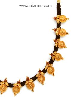 22 Karat Gold 'Lakshmi kasu' Necklace with Black Thread (Temple Jewellery) 
   - 235-GN1602 - in 29.750 Grams for USD $1794.99. 
Made in India by Totaram Jewelers Online this product is in Gold - 22 Karat BIS Hallmark 916 KDM Gold  & is an excellent gift for Adult - Women. Ships fully insured with secured guaranteed delivery for free with your order over $250 from New Jersey USA & comes with 30 days exchange policy. 22k Gold Temple Necklace With Latkans For Puja, 22k Gold Temple Necklace With Latkans For Diwali, Festive Gold Jewelry With Zari Weaving, 22k Gold Temple Necklace With Latkans For Celebration, Diwali Temple Necklace With Gold Beads, 22k Gold Necklaces For Navratri, Kasu Necklace, 22 Karat Gold Jewelry, Necklace With Beads