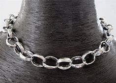 Classic, large, handmade, textured, sterling silver, oval link necklace (N19)This is one of my best sellers.  It is classic in its shape....large, oval links put together simply, with a wonderful rustic texture on the outside.  This necklace is great by itself, stacked with other necklaces or with a pendant hanging from it.  The necklace is 7/16 of an inch wide (almost 1/2 of inch) and is available in 15 inch, 16 inch, 17 inch, 18 inch, 20 inch, 22 inch and 24 inch.  Custom lengths are also avai Artisan Jewelry Handmade, Silver Link Bracelet, Handmade Jewelry Bracelets, Silver Chain Style, Handmade Bangles, Sterling Silver Cross, Matching Necklaces, Link Necklace, Handmade Sterling Silver