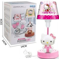 the hello kitty lamp is next to its box