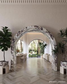 a living room filled with lots of furniture and plants