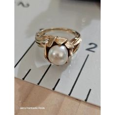 Elegant 14k Gold Lotus Flower Pearl Ring With Size 5.75. This Vintage And Rare Piece Is Perfect For Women Who Love Distinctive Style And Sophistication. Beautiful 14k Gold Material Features A Cultured Pearl Floral Pattern Size 5.75; 6.69 Grams Gold And Mother Of Pearl Color Vintage And Rare Features: Ring Spring Summer Fall Winter Floral Made In Usa Surface Size: Womens 5.75; 6.69 Grams Condition: Pre-Owned Good Bundle And Save Even More! Offers Welcome! Gold Lotus Flower, Rare Features, Gold Lotus, Winter Floral, Color Vintage, Pearl Color, Pearl Ring, Lotus Flower, Womens Jewelry Rings