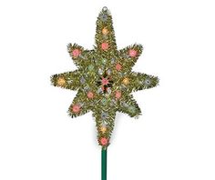 a star shaped christmas tree topper with multicolored lights on it's side