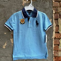 Nwt Polo Ralph Lauren Boys' Big Pony Cotton Mesh Polo Shirt In Blue. Authentic. - Ribbed Polo Collar - Two-Button Placket - Short Sleeves With Ribbed Armbands - Twill "3" Patch At The Right Sleeve - Signature Embroidered Big Pony At The Left Chest - Tennis Tail -Armpit To Armpit: 15", Length: 20" Front, 22" Back. -100% Cotton Preppy Blue Cotton Polo Shirt, Preppy Blue Polo Collar Top, Blue Collared Preppy Tops, Blue Fitted Preppy Tops, Preppy Blue Collared Top, Preppy Short Sleeve Blue Shirt, Preppy Blue Short Sleeve Shirt, Polo Shirt Outfit, Middle Hair