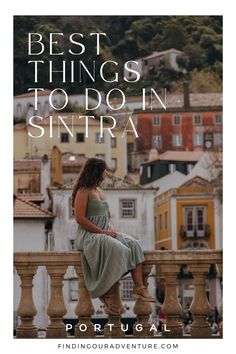 a woman sitting on top of a balcony with the words best things to do in sintra