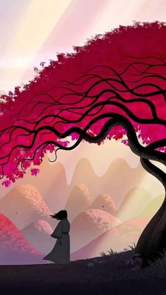 a woman standing under a pink tree with mountains in the background