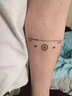 a person with a tattoo on their leg that has an electrical wire attached to it