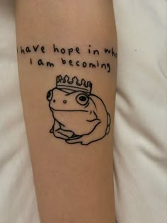 a person with a tattoo on their arm that says i have hope in what i am becoming