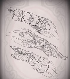 some flowers and leaves are drawn on the side of a sheet of paper with black ink