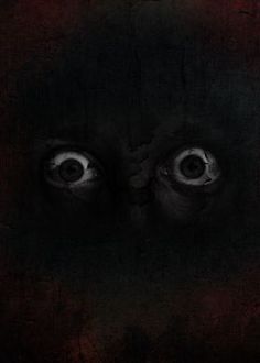 an evil looking face with two large eyes in the middle of dark grungy background