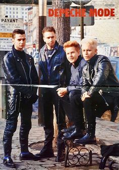 three men standing next to each other in front of a tree on a sidewalk with the caption depeche mode