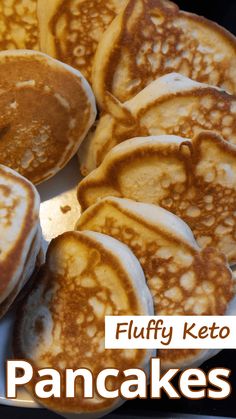 pancakes on a plate with the words fluffy keto pancakes