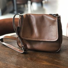 Full Grain Leather Shoulder Bag Women Crossbody Bag Leather Purse Gift for Her T21020 Model Number: T21020 Dimensions: 10.6"L x 3.1"W x 8.7"H / 27 cm(L) x 8 cm(W) x 22 cm(H) Weight: 1.5 lb / 0.7 kg Hardware: Selected Brass Hardware Shoulder Strap: Adjustable Color: Brown / Coffee / Black Features: 1. Genuine Natural Leather2. Inside 1 Mian Pocket, 2 Zipper Pockets3. YKK Zipper4. Adjustable Shoulder Strap5. Can fit Mobile Phone, Wallet. Books, etc. Side Bag, Women Crossbody Bag, Purse Gift, Coffee Black, Brown Coffee, Leather Satchel Bag, Black Features, Genuine Leather Handbag, Genuine Leather Bags