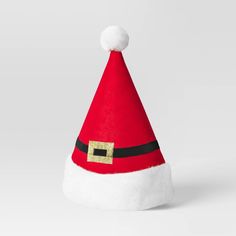 Celebrate the season in festive style with this 17-Inch Santa Belt Christmas Hat from Wondershop™. Made of polyester, this red Santa hat features a white faux-fur cuff, a coordinating fluffy pom pom at the top and a gold-buckled black belt accent at the center. Perfect for holiday parties, parades, or family gatherings, this Santa hat is sure to spread holiday cheer wherever you go. Welcome to the Wondershop™. Santa Belt, Christmas Elf Costume, Red Santa Hat, Santa Belts, Elf Costume, Halloween Costume Shop, Costume Themes, Santa Face, Christmas Costumes