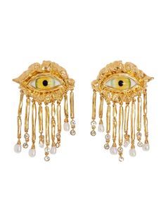 [vc_row][vc_column width=”1/3″][vc_column_text text_larger=”no”] Schiaparelli Women’s Surrealist Eye Chandelier Earrings Schiaparelli Gold Surrealist Eye Chandelier Earrings These chandelier earrings are made of gilded brass. They are composed of two Surrealist Eyes with golden cookie-dough textured frames, with crystal and pearl charmed bars that form a cascading fringe on each side. They close in the back with a clip and stem. Schiaparelli Surrealist Eye Chandelie Surrealist Eye, Golden Cookie, Small Leather Accessories, Elsa Schiaparelli, Pearl Charms, Timeless Accessories, Eye Jewelry, Pearl Drop Earrings, Pearl Drop