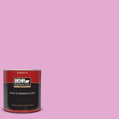 a can of behr paint on a pink background