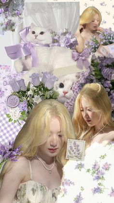 two beautiful women standing next to each other in front of purple and white pictures with cats on them