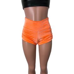 Sexier and more flattering! Our classic booty shorts made in stretch orange velvet with ruching on each side. Made to flatter your figure and move with you. The standard inseam is 2.5" - but can be customized. Choose between low-rise, mid-rise and high-waist (high-waist shown in photos). Orange Fitted Workout Bottoms, Fitted Orange Workout Bottoms, Orange Fitted High-waisted Shorts, Fitted Orange High-waisted Shorts, Fitted High-waisted Orange Shorts, Fitted Short Orange Bottoms, Fitted Short Length Orange Bottoms, Orange Stretch High-waisted Shorts, High Waist Fitted Orange Shorts