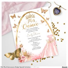 a pink and gold princess themed bridal gown with butterflies on the side, next to a