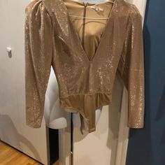 Sparkly , Very Sexy , Deep V Body Suit.. Never Worn, Due To Very Low Cut.. Size Xxs,Has A Minor Puff In Shoulder Area A Minor, Body Suit, Low Cut, Deep V, Womens Tops, Gold