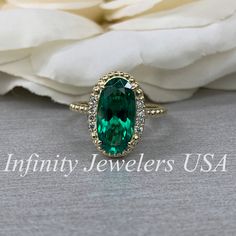 Elongated Oval Ladies Ring / Green Emerald Engagement Ring / Diamond And Emerald Wedding Ring / Anniversary Gift / 14k Yellow Gold / #6159 #WeddingRing #BridalGift #EngagementRing #LadiesGift #PromiseRing #DiamondRing #ElongatedOvalRing #HaloRing #EmeraldRing #ProposalRing Emerald Engagement Ring Diamond, Green Emerald Engagement Ring, Emerald Engagement Ring Green, Emerald Engagement Ring Set, Elongated Oval, Emerald Wedding Rings, Blue Crystal Earrings, Engagement Ring Diamond, Emerald Wedding