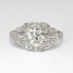 an antique style diamond ring with baguetts