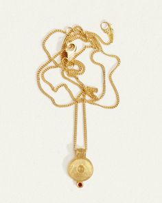 The Argos Necklace has an 18k gold vermeil coin pendant inspired by ancient libation bowls & fine curb chain. Shop ruby necklace honouring self-care. 14k Gold Spiritual Coin Necklace With Round Pendant, Spiritual Yellow Gold Medallion Necklace With Large Pendant, Amulet Style Yellow Gold Medallion Necklace, Amulet Style Coin Necklace With Adjustable Chain, Spiritual Gold-plated Medallion Necklace With Round Pendant, Necklace With Large Round Pendant In Recycled Gold, Spiritual Gold Plated Round Medallion Necklace, Spiritual Gold Plated Medallion Necklace, Yellow Gold Charm Necklace With Oval Coin Pendant