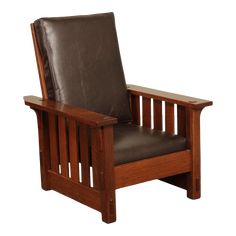 a wooden chair with brown leather upholstered on the back and armrests