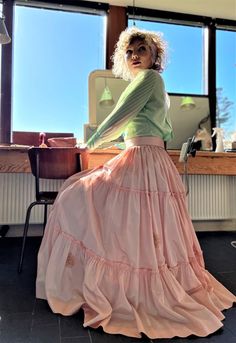 Size M The skirt is made out of used vintage taffeta silk from the 1950s. The silk has a few sign of use. Please see photo. Waist 79 cm - 31,1 inches  Length 100 cm - 39,37 inches  By request waist can be adjusted shop@bywaltz.dk Petti skin is sold separately  Follow us on Instagram @by_waltz https://www.instagram.com/by_waltz/ Maxi Pink Skirt Outfit, Spring Fitted Taffeta Skirt, Vintage Party Petticoat With Ruffled Skirt, Vintage Silk Long Skirt, Vintage Voluminous Full Skirt Petticoat, Vintage Full Voluminous Petticoat, Vintage Tiered Skirt For Party, Vintage Ruffled Skirt For Party, Vintage Flowy Tiered Petticoat