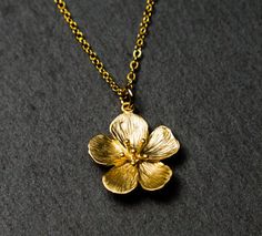 Gold Flower Necklace. Necklace in Gift Box. | Etsy Brass Flower Pendant Necklaces As Gifts, Brass Flower Pendant Necklace For Gift, Brass Flower Pendant Necklace As Gift, Gold Flower Pendant Necklace With Adjustable Chain, Gold Flower Shaped Nickel Free Necklace, Gold Necklace With Flower Charm In Brass, Gold Brass Necklace With Flower Charm, Gold Pendant Flower Necklace With Adjustable Chain, Gold Nickel-free Flower Pendant Necklace