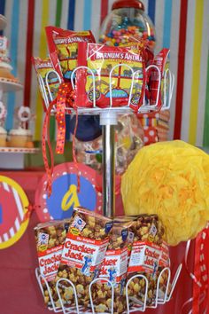 a table with candy, candies and other items on it at a birthday party