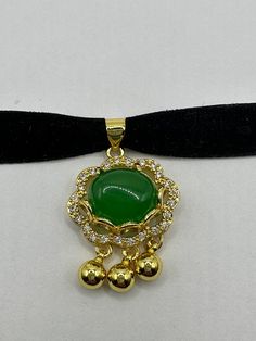 "Vintage Green Jade Choker Gold Finish necklace pendant All green Jade set in an ornate setting golden bronze frame. about 1 in long All jewelry is shipped in a nice gift box.   Check out our over a THOUSAND great reviews This is \"fun jade\" Color enhanced stone. Vintage 1970's re finished." Formal Gold Jade Necklaces, Formal Gold Jade Necklace, Green Locket Jewelry, Green Round Locket Necklace, Green Medallion Locket Jewelry, Gold Jade Round Pendant Jewelry, Gold Jade Round Pendant Necklace, Green Locket Necklace With Round Pendant, Gold Jade Necklace With Round Pendant